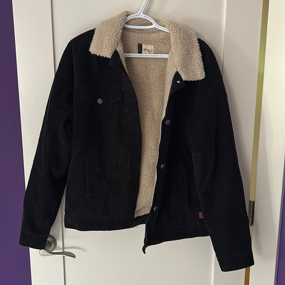Roxy Corduroy’s black fleece jacket
